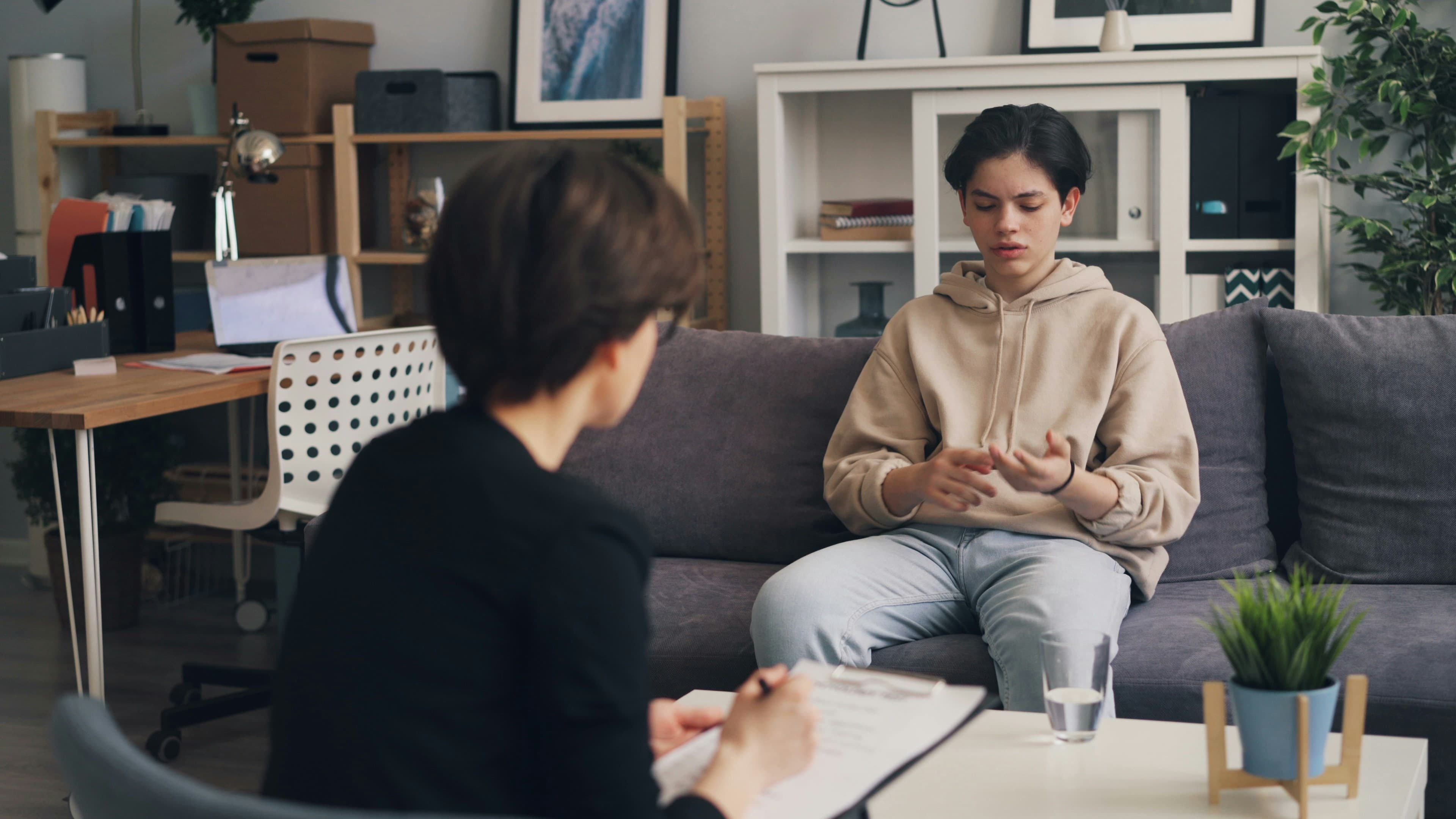 A professional working with a child during a session